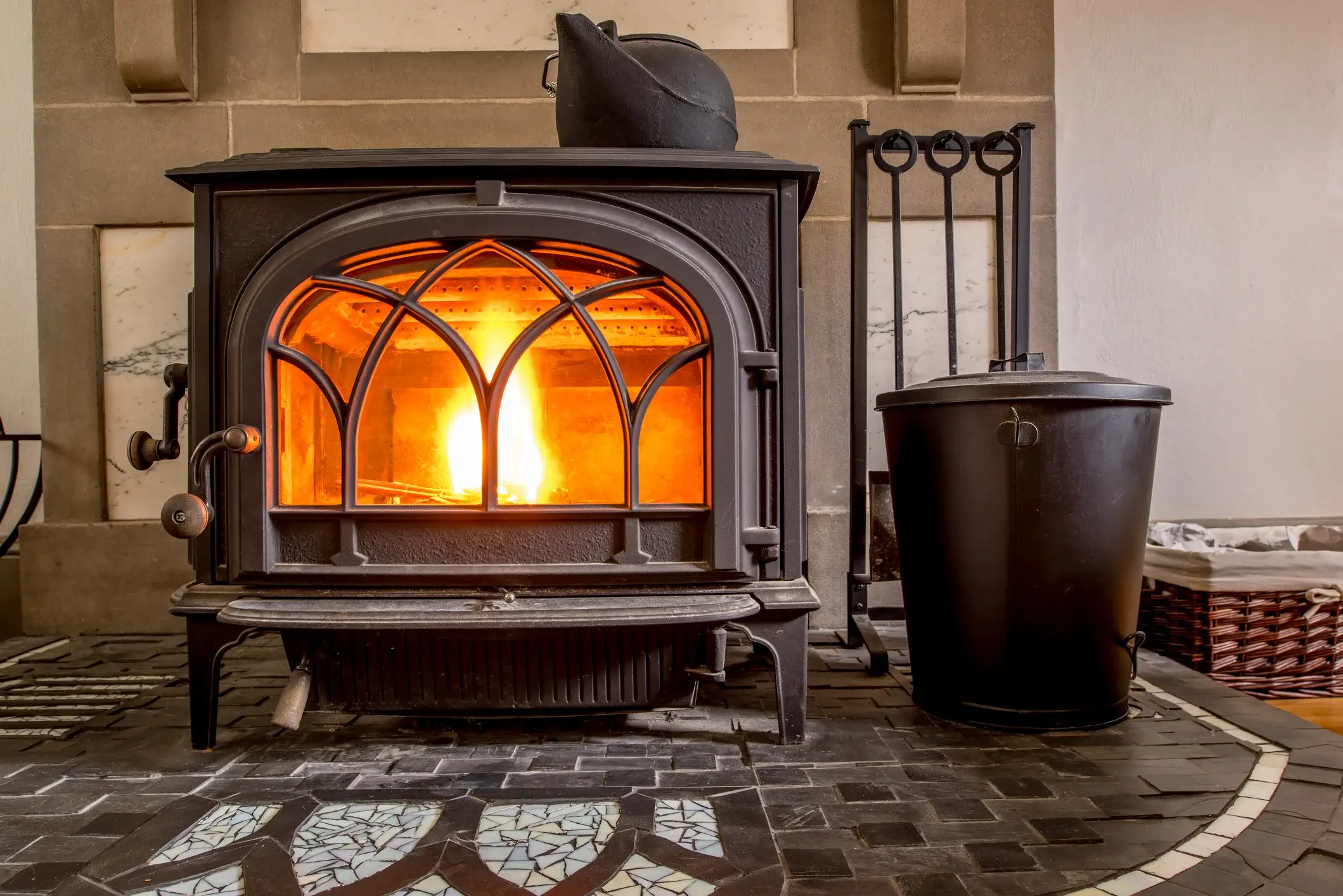 Traditional wood burning stove with a log fire